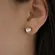 Brinco Ponto de Luz G Banhado a Ouro 18 k