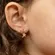 Brinco Pequeno Lacinho Navete com Pingente Estrelinha Cravejada em Zircônias Banhado a Ouro 18K