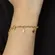 Pulseira Infantil Pingente Estrelinhas