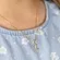Colar Infantil Meia Lua Cravejada com Zircônias Banhado a Ouro 18k