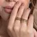 Anel Cinco Aros Cravejados com Zircônias Coloridas Banhado a Ouro 18 k