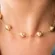 Colar Choker com Bolas Lisas e Corrente Cartier Banhado a Ouro 18 k