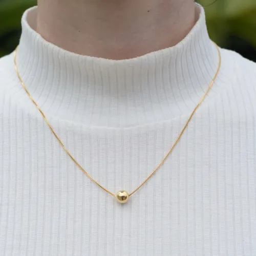 Colar Pingente Bolinha Lisa: Um Elogio à Elegância Minimalista