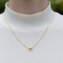 Colar Pingente Bolinha Lisa: Um Elogio à Elegância Minimalista