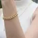 Pulseira Corrente de Esferas: Uma Expressão de Elegância Versátil