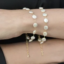 Pulseira de Pérola Barroca com Detalhe Redonda Achatada