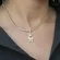 Pingente de Menina e Menino Cravejados com Zircônias