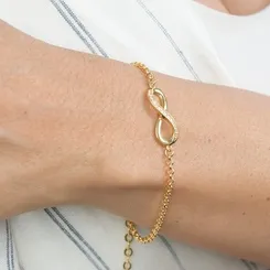 Pulseira com Pingente de Infinito Cravejado com Zircônias – Elegância e Significado