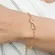 Pulseira com Pingente de Infinito Cravejado com Zircônias – Elegância e Significado