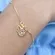 Pulseira Infantil com Pingente do Rostinho da Minnie Vazado Banhado a Ouro 18k – Encanto e Brilho