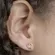 Brinco Coração Liso e Vazado com Zircônias Coloridas Tamanho  P Banhado a Ouro 18k