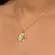 Colar com Pingente de Flor com Pétalas Arredondadas e Escovadas - Banhado a Ouro 18k