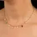 Colar com Pingentes de Cristais Banhado a Ouro 18k – Sofisticação e Brilho Encantador