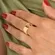 Anel Liso com Zircônias Transpassadas  Banhado a Ouro 18k