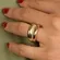 Anel Robusto Banhado a Ouro 18k com Fileiras de Zircônias Cravejadas