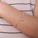 Pulseira Infantil com Pingentes de Cristais e Cereja Banhada a Ouro 18k