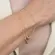 Pulseira Feminina com Três Correntes e Bolinhas Banhada a Ouro 18k
