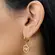 Brinco Argola Articulada com Pingente Redondo Divino Cravejado Banhado a Ouro 18 k