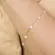 Pulseira com Pingentes de Cristais Banhada a Ouro 18k