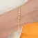 Pulseira Cruzinhas Lisas Banhada a Ouro 18 k