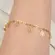 Pulseira com Pingente Árvore da Vida Vazado Banhada a Ouro 18K
