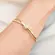 Pulseira Bracelete Nó Cravejado Banhada a Ouro 18K