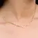Colar Choker Riviera Colorida com Pingente de Coração Vazado Banhado a Ouro 18K