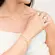Pulseira Riviera Colorida com Pingente de Coração Vazado Banhada a Ouro 18K