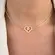 Colar Choker Coração Cravejado com Zircônias com Patinha Lisa no Centro Banhado a Ouro 18K