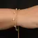 Pulseira Dupla Pérolas Delicadas Banhado a Ouro 18 k