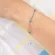 Pulseira Olho Grego Azul Intercalado com Corrente