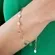 Pulseira Filetes e Pingentes de Círculos Lisos