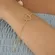 Pulseira Coração Vazado Zircônias