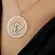 Colar Círculo Grande Vazado com Detalhes Divino em Alto Relevo Banhado a Ouro 18k