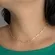 Colar Choker Cruzinhas Banhado a Ouro 18 k