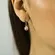 Argolinha Articulada com Pingnete Pedra Cristal Banhado a Ouro 18 k