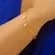 Pulseira Corrente Bolinha e  Cruzinhas