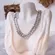 Colar Choker Groumet Entrelaçada