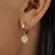 Argola Articulada Pingente Coração Zircônia Banhada a Ouro 18k
