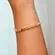 Pulseira Fita Círculos Ponto Luz