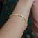 Pulseira Fita Círculos Ponto Luz