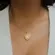 Colar Relicário Coração Vazado Banhado a Ouro 18 k