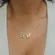 Colar Duas Plaquinhas Quadradas Cruz e Nossa Senhora